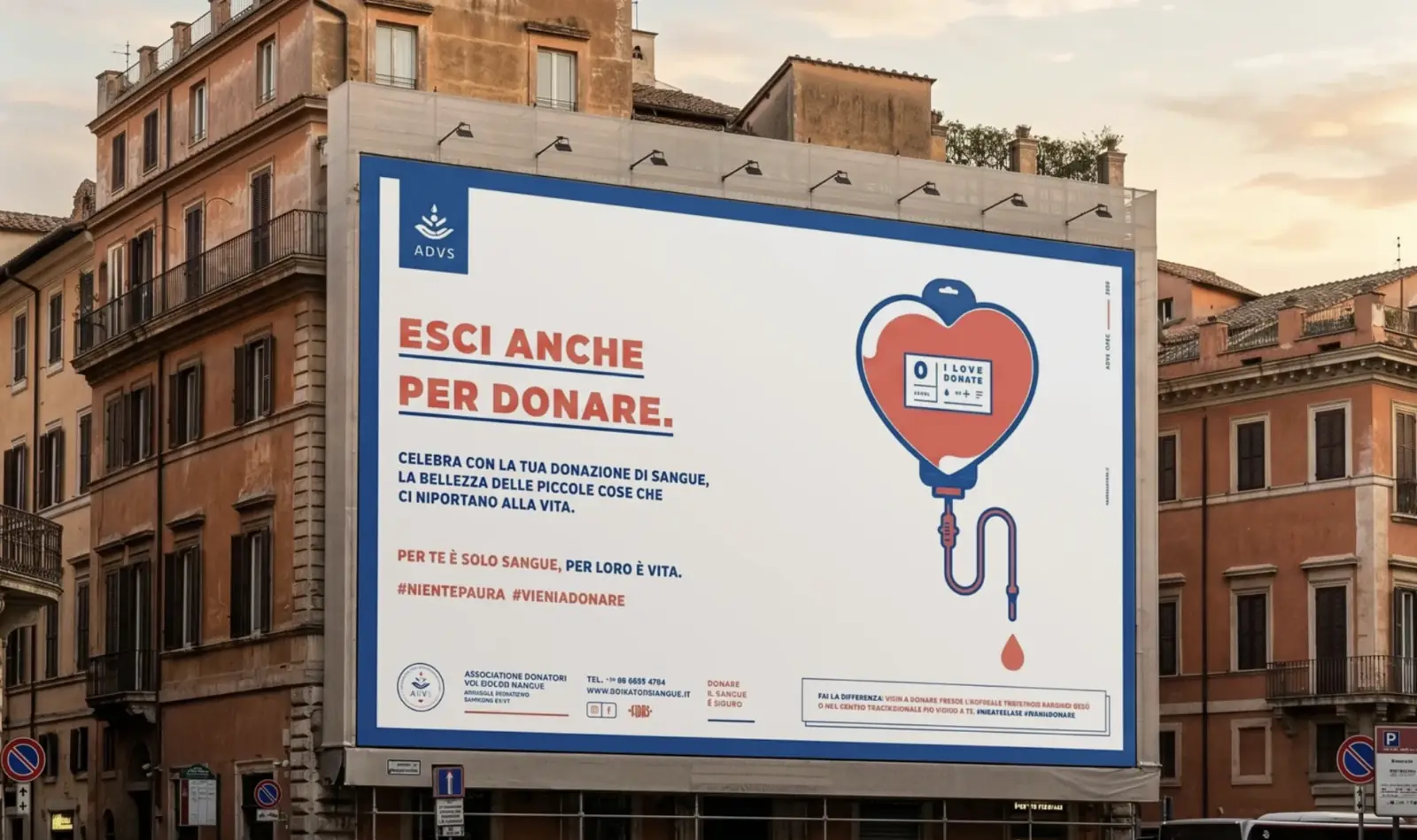 Maxi affissione ADVS Esci anche per donare su un palazzo di Roma